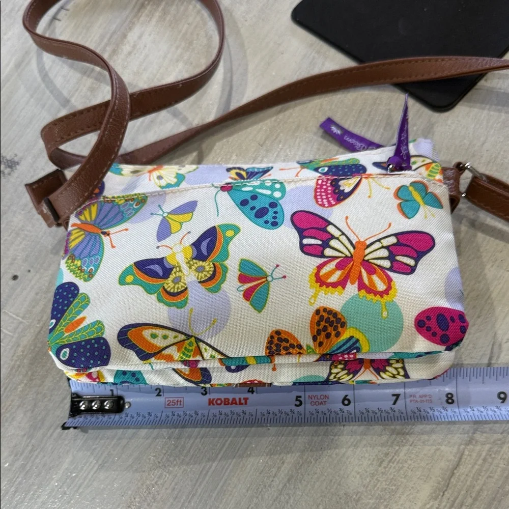 Lily Bloom Cream Crossbody Bag with Multicolor Butterfly Print and Brown Trim - Picture 9 of 12